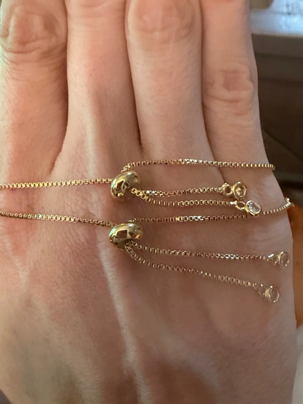 NWOT Gold w Floral cream colored enamel Clover and Gems Layered Bracelets 2 pc